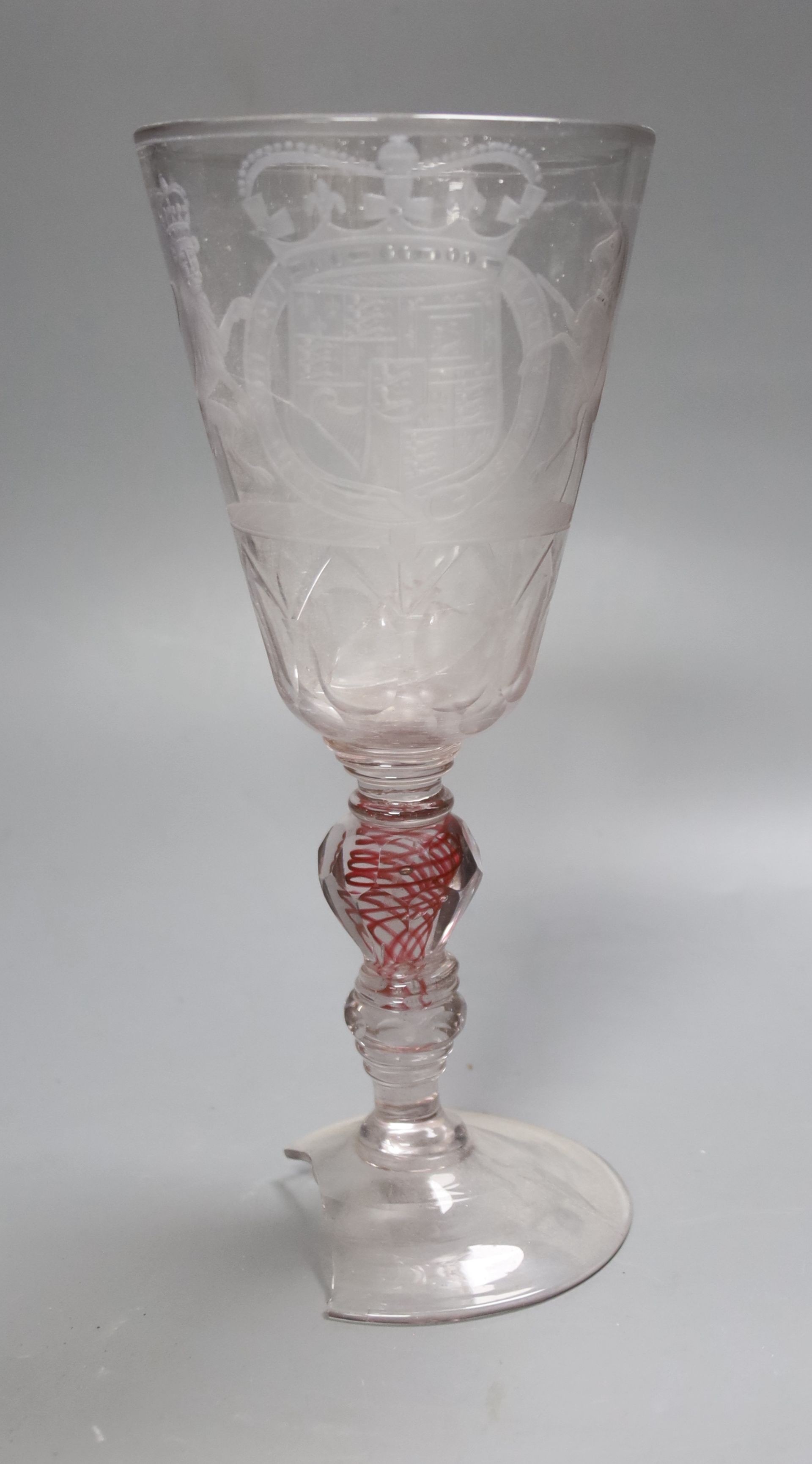 A Bohemian ruby twist engraved armorial goblet and cover, circa 1700, engraved with the Royal Arms, height 25cm, the foot damaged (a.f.)